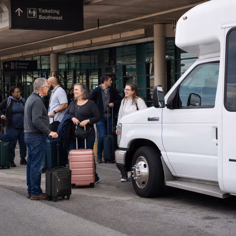 Black Mercedes Sprinter van staged for an Mobile Airport Transportation group