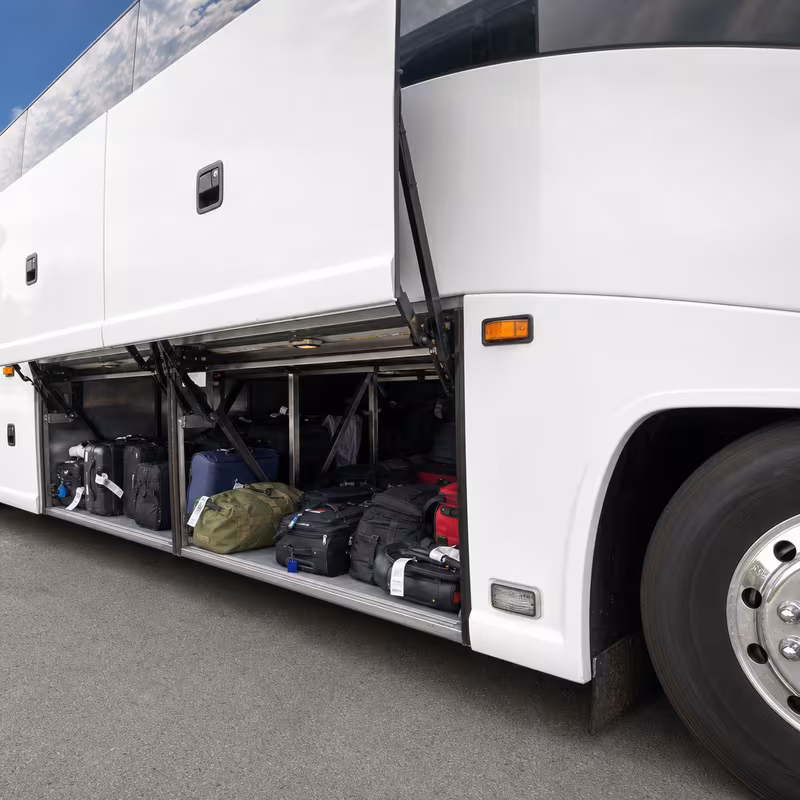 Party bus interior with wraparound leather seating and LED lighting in Mobile
