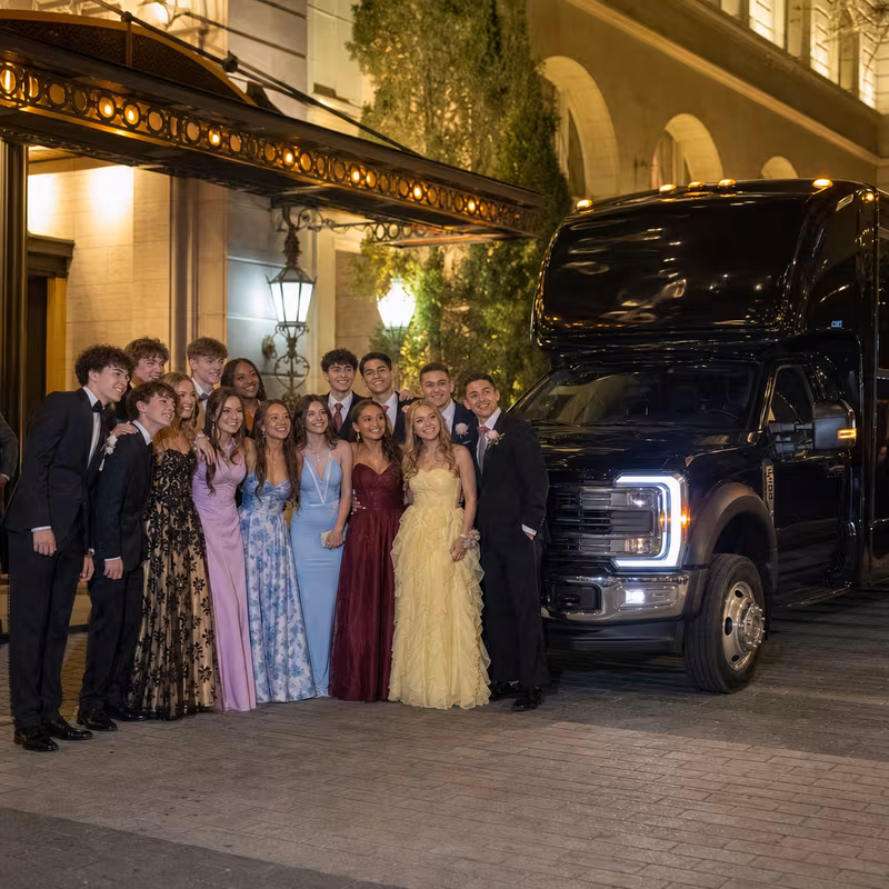 Party bus interior with wraparound leather seating and LED lighting in Mobile